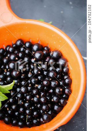 Blackberry in a sieve Blackberry in a sieve 104782102