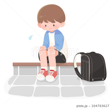 玄関で落ち込む小学生の子供 104783627