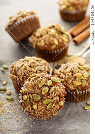 Healthy pumpkin muffins with seeds 104784556