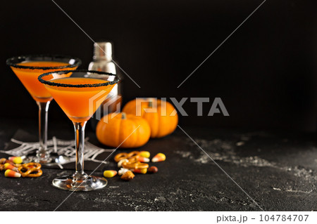 Halloween or fall cocktail pumpkintini Halloween or fall cocktail pumpkintini 104784707