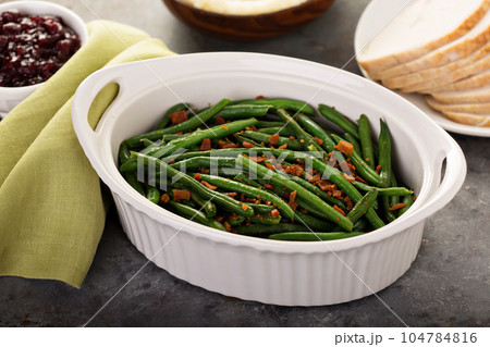 Green beans with bacon for Thanksgiving or Christmas dinner 104784816