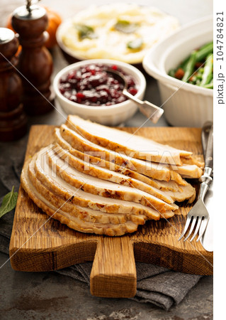 Sliced roasted turkey breast for Thanksgiving or Christmas Sliced roasted turkey breast for Thanksgiving or Christmas 104784821