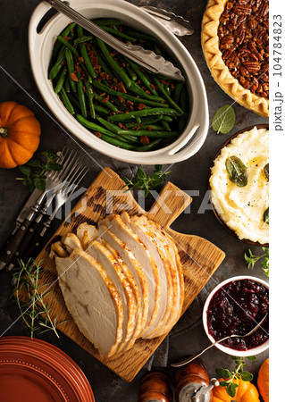 Sliced roasted tukey breast for Thanksgiving or Christmas 104784823