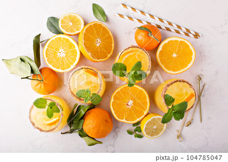 Orange and lemon margarita cocktail 104785047
