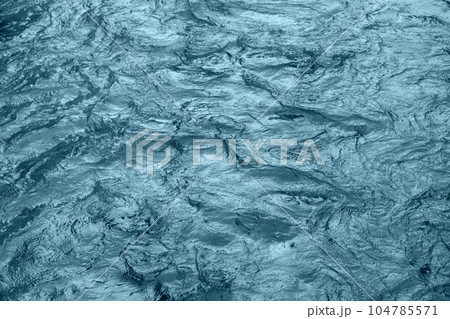 Abstract underwater wallpaper. Aquatic ripple wavy blue water surface 104785571