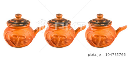 Set of pots made of clay for baking isolated on white background. Free space for text. Wide photo. 104785766