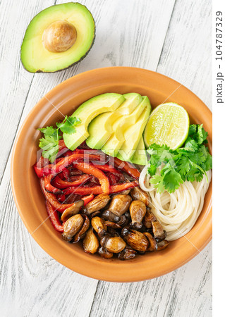 Bowl of rice noodles and vegetables Bowl of rice noodles and vegetables 104787329