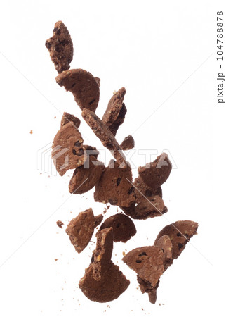 Cookie Chocolate ship fall fly in mid air, Cocoa Cookie Chocolate ship floating. Cookie Chocolate ship round crack crunch throw in air. White background isolated freeze motion high speed shutter Cookie Chocolate ship fall fly in mid air, Cocoa Cookie Chocolate ship floating. Cookie Chocolate ship round crack crunch throw in air. White background isolated freeze motion high speed shutter 104788878