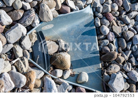 underground drainage storm drain with winged walls surrounded by rock for erosion control  104792553
