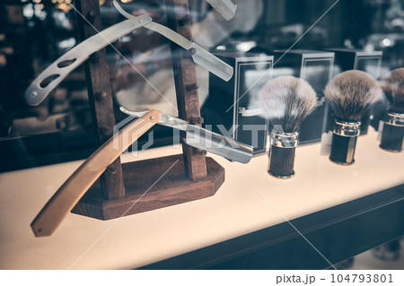 Male grooming accessories in a showcase of barbershop Male grooming accessories in a showcase of barbershop 104793801