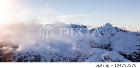 Canadian Coastal Mountain Landscape covered in Clouds. Aerial Panorama 104793970
