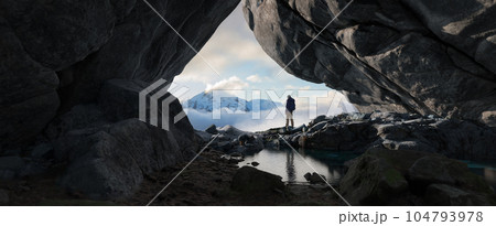 Adventurous Man Standing in cave on top of Mountain. Extreme Adventure Composite 104793978