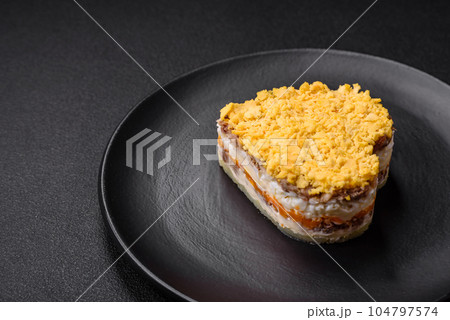 Delicious fresh mimosa salad with canned fish, egg, moinese, cheese, salt and spices Delicious fresh mimosa salad with canned fish, egg, moinese, cheese, salt and spices 104797574