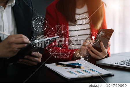 Businessman team thinking ideas strategy working concept at the desk in the office. 104799069