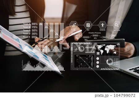Business concept, Business man and business woman working and meeting with chart at office. 104799072