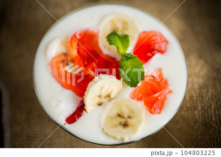 homemade sweet yogurt with bananas and pieces of fruit jelly homemade sweet yogurt with bananas and pieces of fruit jelly 104803225
