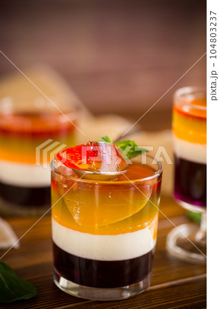 lot of colored sweet fruit jelly in a glass lot of colored sweet fruit jelly in a glass 104803237