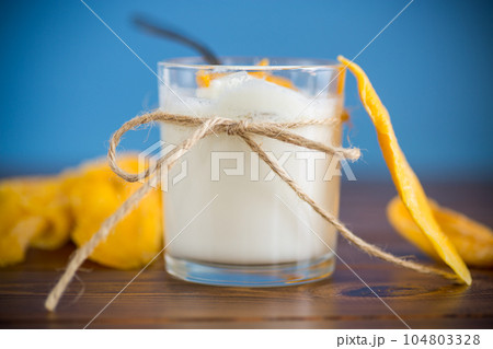 homemade sweet yogurt in a glass with mango homemade sweet yogurt in a glass with mango 104803328