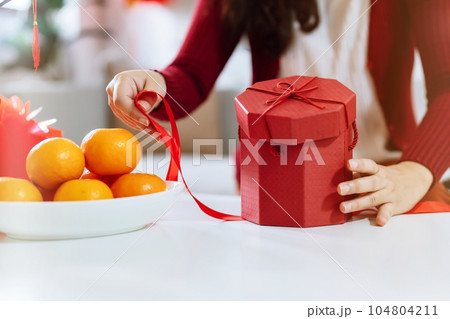 Asian Mom Delivers Red Gift Box Stock Photo 1236607957