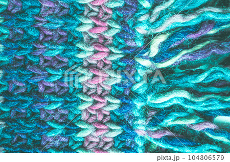 Organic knitted background with macro weave threads. Organic knitted background with macro weave threads. 104806579