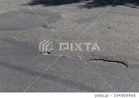 asphalt damaged road asphalt damaged road 104808408
