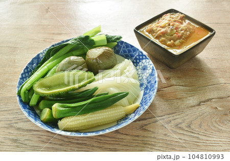 spicy mashed mackerel chili paste sauce eat couple with boiled vegetable on plate spicy mashed mackerel chili paste sauce eat couple with boiled vegetable on plate 104810993