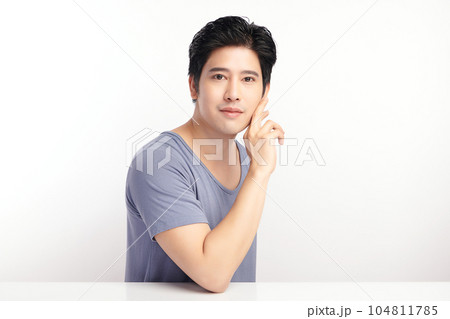 handsome young asian man on white background, Face care, Facial treatment, Cosmetology, beauty and spa, Asian men portrait. handsome young asian man on white background, Face care, Facial treatment, Cosmetology, beauty and spa, Asian men portrait. 104811785