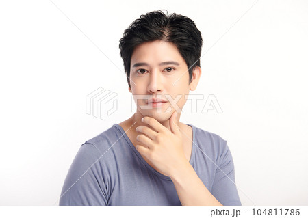 handsome young asian man on white background, Face care, Facial treatment, Cosmetology, beauty and spa, Asian men portrait. handsome young asian man on white background, Face care, Facial treatment, Cosmetology, beauty and spa, Asian men portrait. 104811786