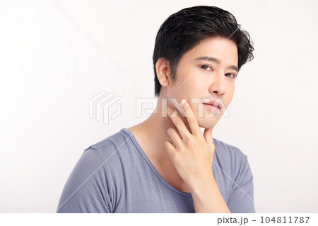 handsome young asian man on white background, Face care, Facial treatment, Cosmetology, beauty and spa, Asian men portrait. handsome young asian man on white background, Face care, Facial treatment, Cosmetology, beauty and spa, Asian men portrait. 104811787