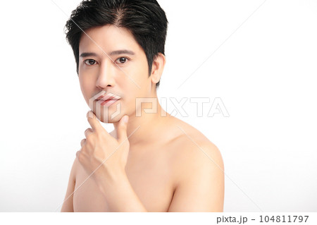 handsome young asian man on white background, Face care, Facial treatment, Cosmetology, beauty and spa, Asian men portrait. handsome young asian man on white background, Face care, Facial treatment, Cosmetology, beauty and spa, Asian men portrait. 104811797
