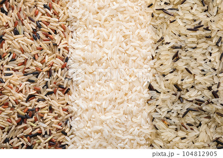 Different types of rice as background, top view Different types of rice as background, top view 104812905