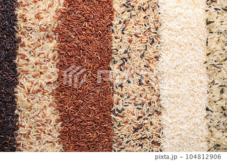 Different types of rice as background, top view Different types of rice as background, top view 104812906