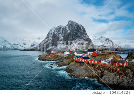 Hamnoy fishing village with red rorbu houses in Norwegian fjord in winter. Lofoten Islands, Norway 104814228
