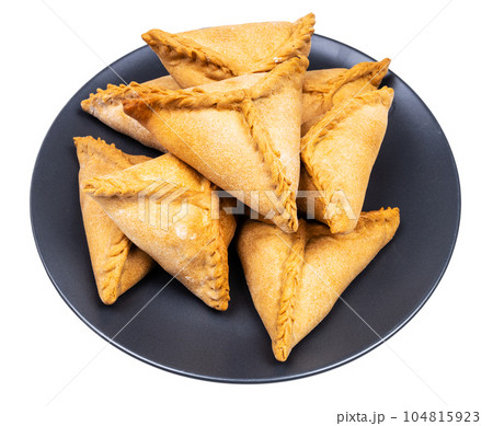 many ochpochmak on black plate isolated on white 104815923