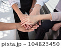 close up of business people shaking hands 104823450