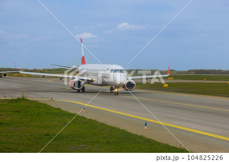 Plane on runway is preparing for take off departure Plane on runway is preparing for take off departure 104825226