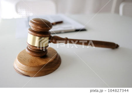 Judge gavel hammer on Lawyer desk. 104827344