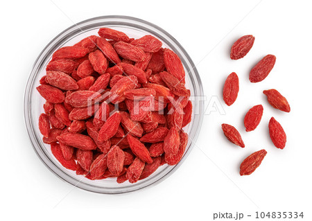 Dried goji berries in a bowl isolated on white background. Top view. Flat lay 104835334