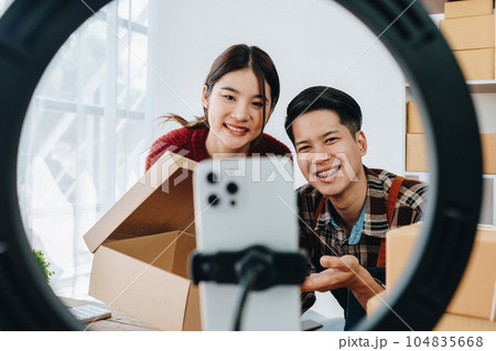 family business Asian people, vlogger, blog, presenting online products, live video, social media, record her, sell online via digital cameras. family business Asian people, vlogger, blog, presenting online products, live video, social media, record her, sell online via digital cameras. 104835668