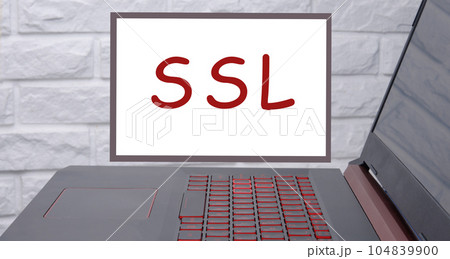 SSL, security certificate for web site written on the magnetic board next to the laptop 104839900
