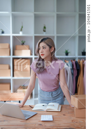 Portrait Of Asian Female Owner Of Fashion Store Clothing Store successful happy smile at small business, sme or ecommerce concepts. 104841501