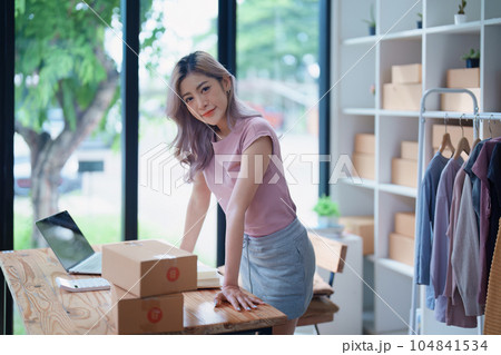 Portrait Of Asian Female Owner Of Fashion Store Clothing Store successful happy smile at small business, sme or ecommerce concepts. 104841534