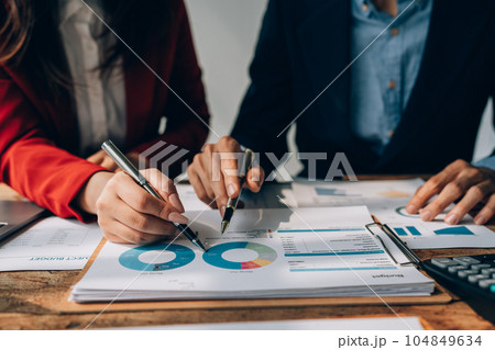 startup business, business team planning teamwork paperwork audit and discussing marketing, profit, budget of company in meeting room 104849634