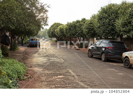 Creative composition of a small street against light Creative composition of a small street against light 104852804
