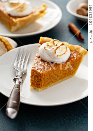 Sweet potato pie with marshmallow topping 104852994