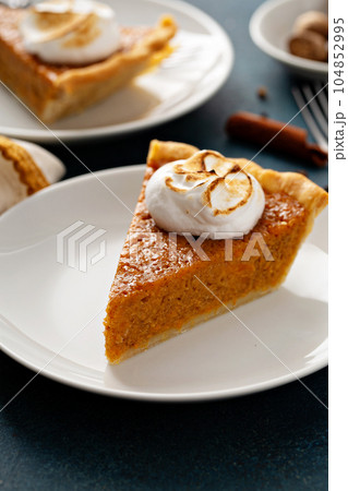 Sweet potato pie with marshmallow topping 104852995