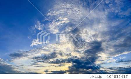 clouds in the blue sky 104853417