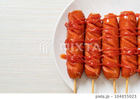 fried sausage skewer with ketchup fried sausage skewer with ketchup 104855023