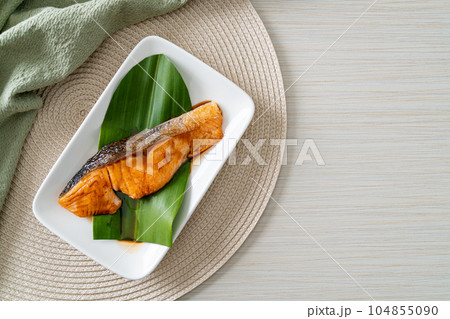 Grilled Salmon Steak with Soy Sauce Grilled Salmon Steak with Soy Sauce 104855090