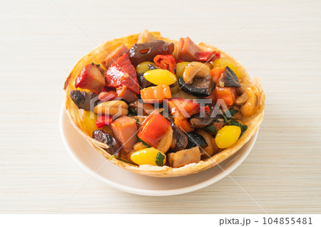 Stir fried mixed Chinese fruits .and nuts Stir fried mixed Chinese fruits .and nuts 104855481